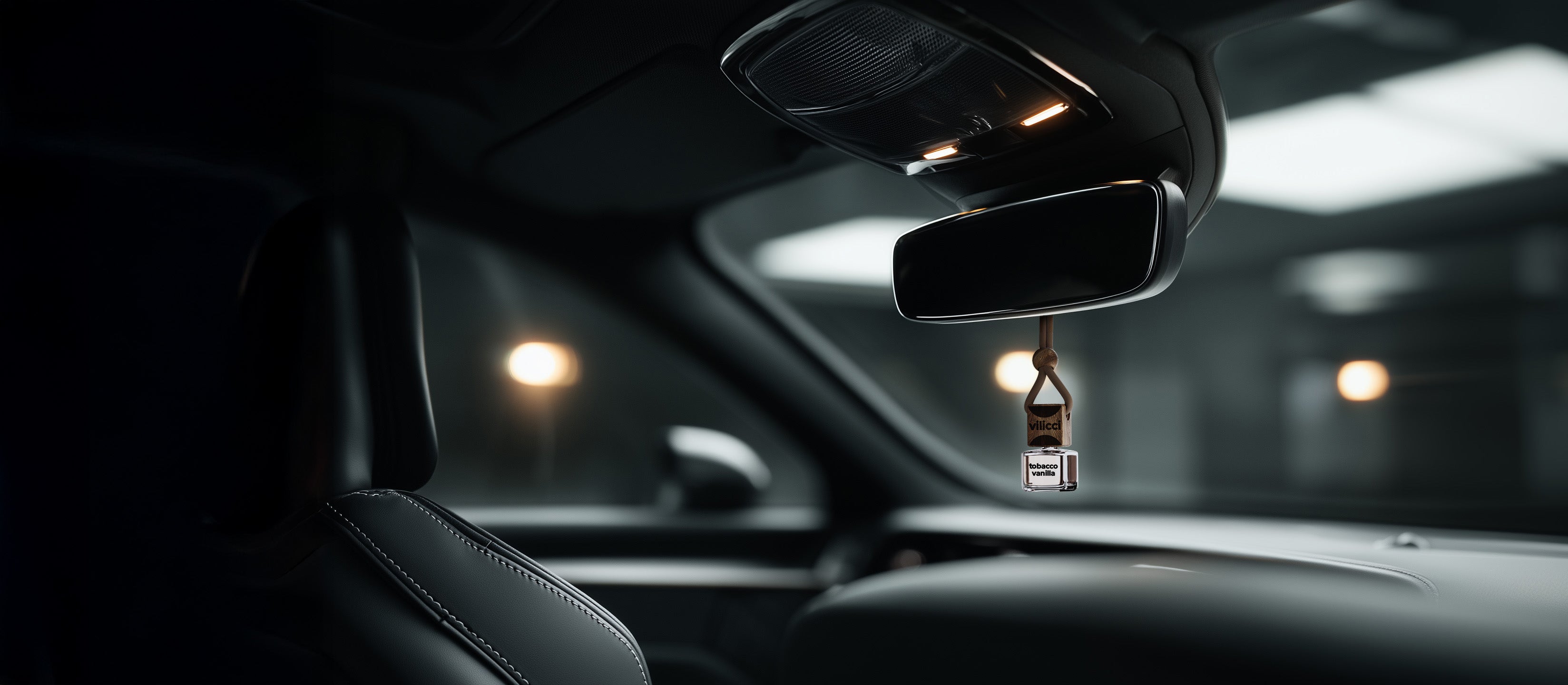 Vilicci car diffuser hanging in luxury vehicle interior