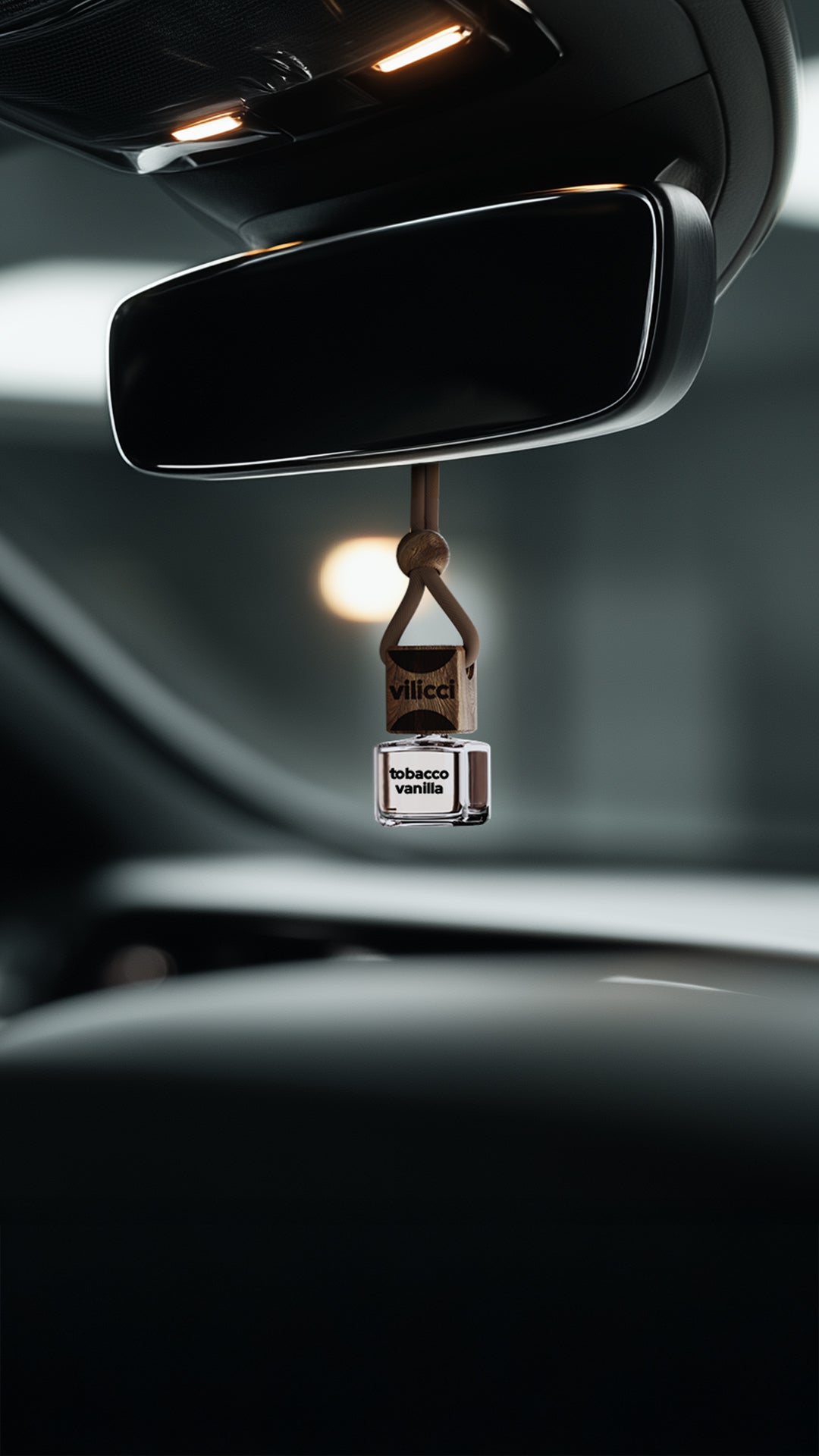 Vilicci car diffuser hanging in luxury vehicle interior